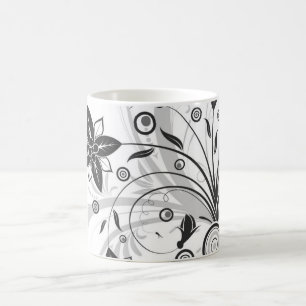 Tasse der schwarzweißen Blume