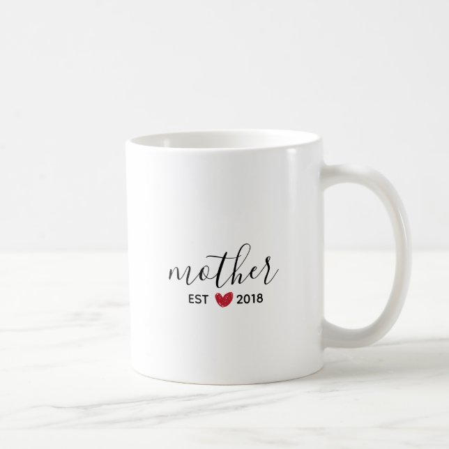 Tasse des Kaffees aus dem Roten Herz (Rechts)