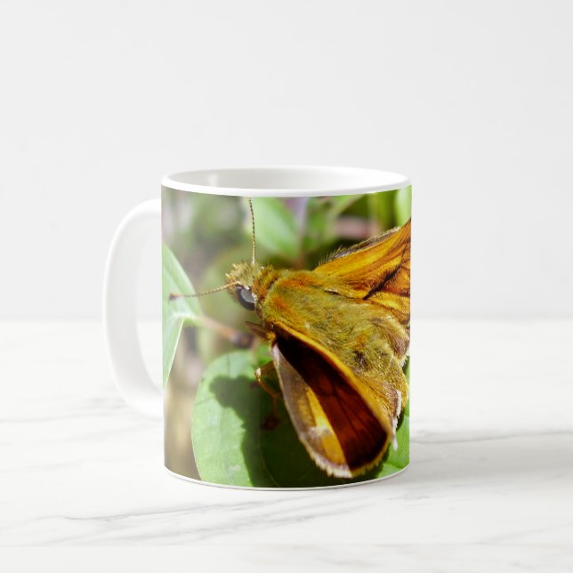 Tasse des kleinen Schmetterlingskäfers (Vorderseite Links)