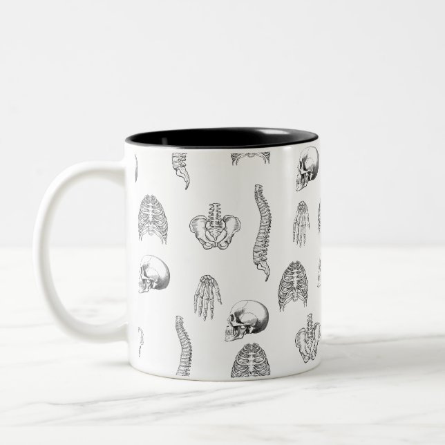 Tasse des menschlichen Skelettmusters (Links)