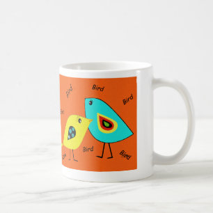 Tasse d'orange d'oiseau d'oiseau