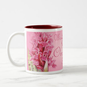 Tasse d'orchidée de rose du plus grand