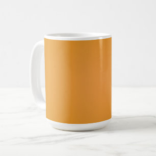 Tasse en céramique blanche avec un emballage orang
