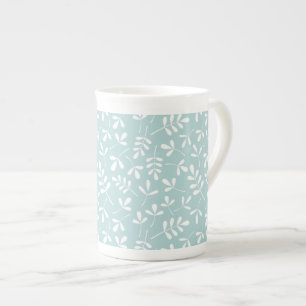 Tasse En Porcelaine Blanc assorti de motif de feuille sur le bleu