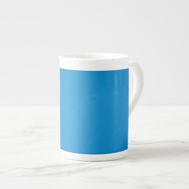 Tasse En Porcelaine Bleu clair avec texture granuleuse (Devant droit)