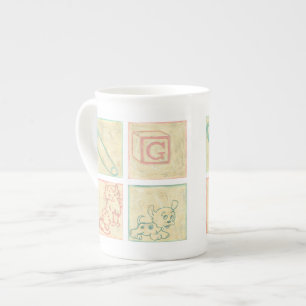 Tasse En Porcelaine Blocs illustration de bébé par Chariklia Zarris
