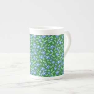 Tasse En Porcelaine Des bords bleus brillants sur des bords floraux ve