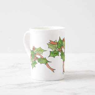 Tasse En Porcelaine Enveloppé Dans La Mug Des Fêtes