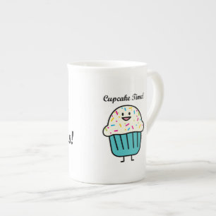 Tasse En Porcelaine Le temps de petit gâteau avec arrose le fondant