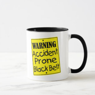 Tasse encline de ceinture noire d'accidents