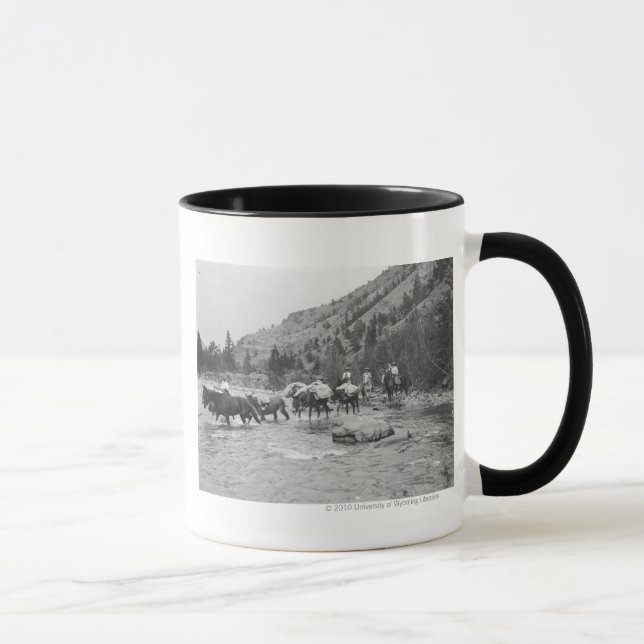 Tasse Entraînement des mules de paquet à travers une (Droite)