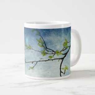 Tasse Géante Branche de l'arbre sur le ciel texturé