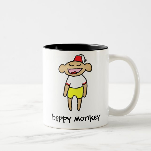 Tasse heureuse de singe (Droit)