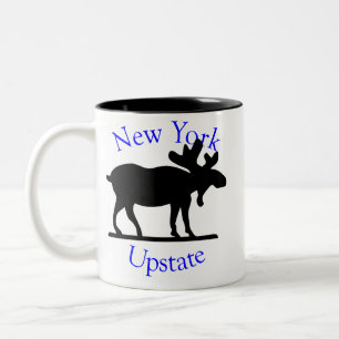 Tasse hors de la ville d'orignaux de New York