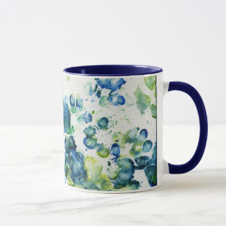 Tasse irlandaise d'or avec des accents