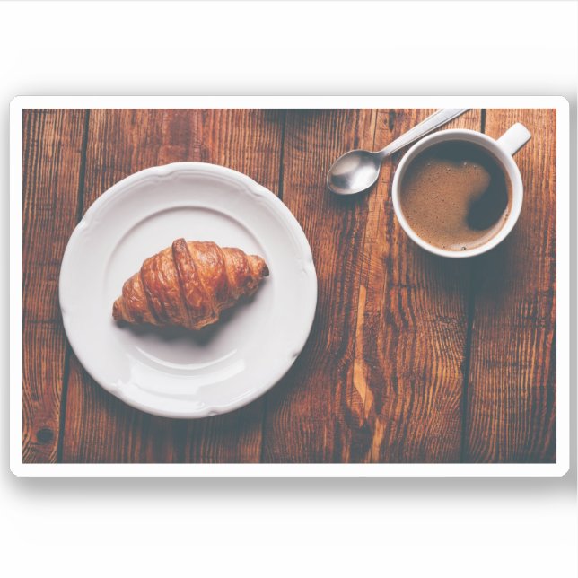 Tasse Kaffee und Croissant am rustikalen Tisch Aufkleber (Vorderseite)