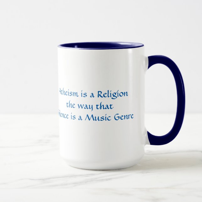 Tasse L'athéisme est une religion comme le silence est u (Droite)