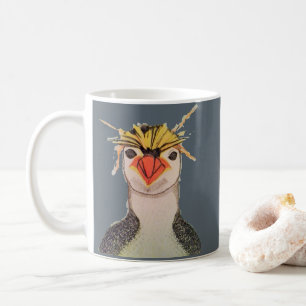 Tasse mignonne de visage de pingouin