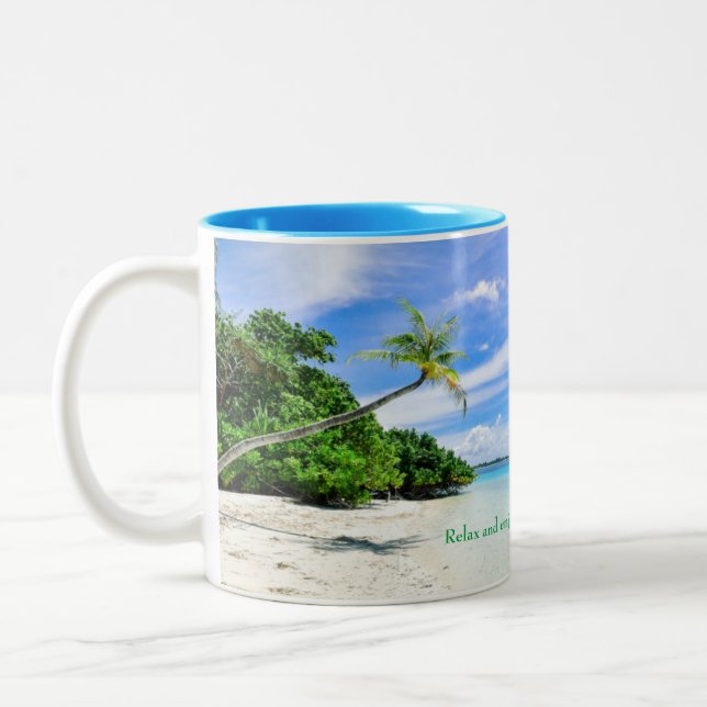 Tasse mit blauem Innen- u. tropischem Druck (Links)
