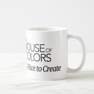 Tasse mit dem Haus des Farblogos