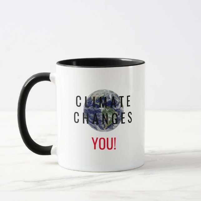 Tasse mit Klimawandel-Bewusstseinsbotschaft (Links)