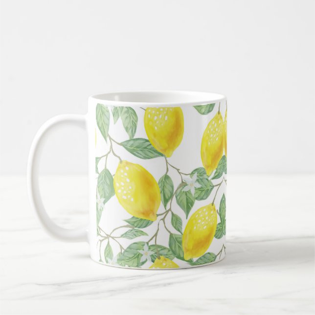Tasse mit künstlerisch gestaltetem Zitronenwein (Links)