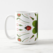 Tasse mit ladybug-Design, rot & grün auf weiß.