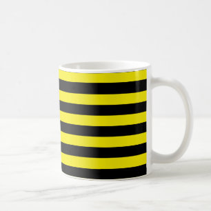 Tasse noire et jaune de rayures