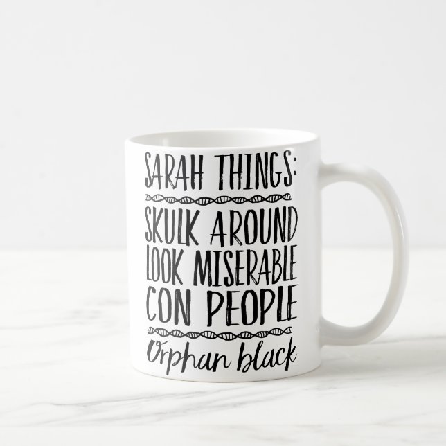 Tasse noire orpheline de choses de Sarah (Droite)