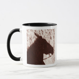 Tasse ombre de la tête de cheval d'équitation sur le