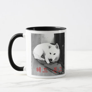 Tasse principale de partie de jambes en l'air