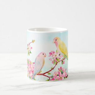 Tasse rose de fleurs et d'inséparables d'aquarell