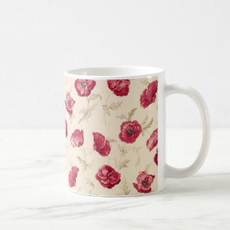 Tasse rouge de motif de pavots