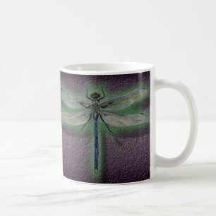 Tasse rougeoyante de tasse de café de libellule