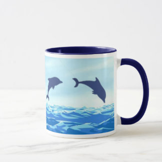 Tasse sautante de dauphins