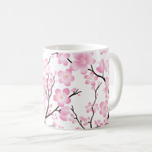 tasse sensible de fleurs de cerisier blanches