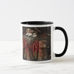 Tasse Un épagneul posé sur un coussin brodé
