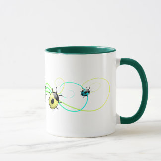Tasse verte de coccinelles