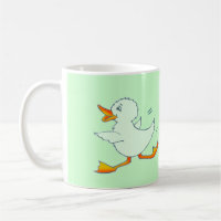 Tasse verte en bon état de canard de Quackers