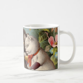Tasse vilaine de chats