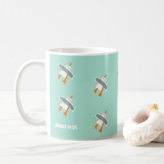 Tasse vintage de mouette de vert de style par le