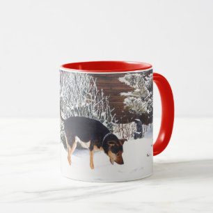 Tasse Winter snow scene with cute black and tan dog