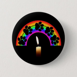 Tastenanschläge auf einen Regenbogen mit Kerze Button