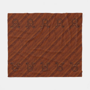 Taurus Zodiac Symbol auf Mahogany wie Druck Fleecedecke
