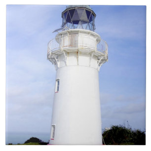Te Araroa, Neuseeland. Ein Leuchtturm gibt Fliese