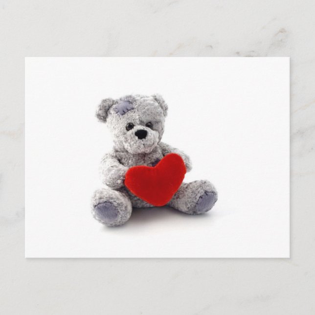 Teddy Bärenspielzeug, das ein Herz auf weißem Hint Postkarte (Vorderseite)