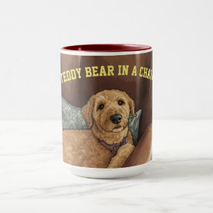 Teddybär in einem Sessel, der Becher Tasse