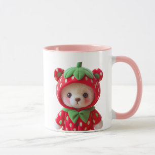Teddybär mit Kapuze im Erdbeerkostüm. Tasse