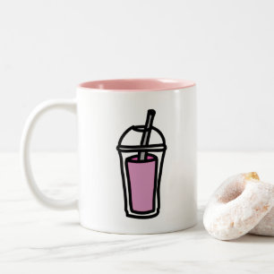 Tee aus Milchtee, rosa Zweifarbige Tasse