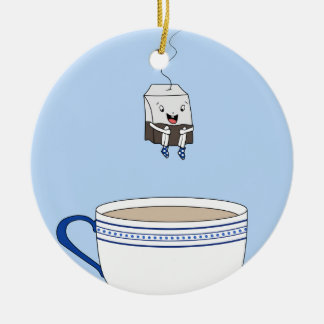 Teebeutel springt in Tasse Keramikornament